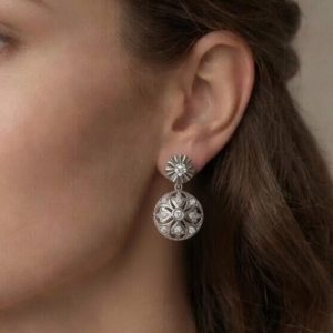 Pendientes de diamantes con movimiento en oro de 18k - Imagen 1